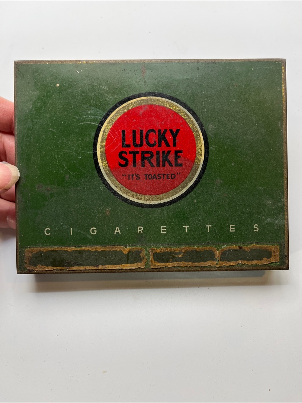 Antique pre-WWII green "Flat Fifties" metal cigarette tin for Lucky Strike.